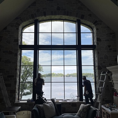 Lake Minnetonka view preserved through residential window film that reduces glare without blocking scenery