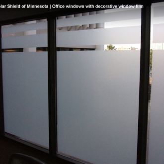 Office windows with decorative window film.